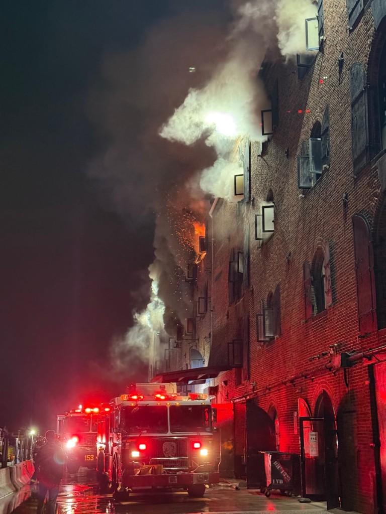 Building fire at night with emergency response for 3D spectral tomography